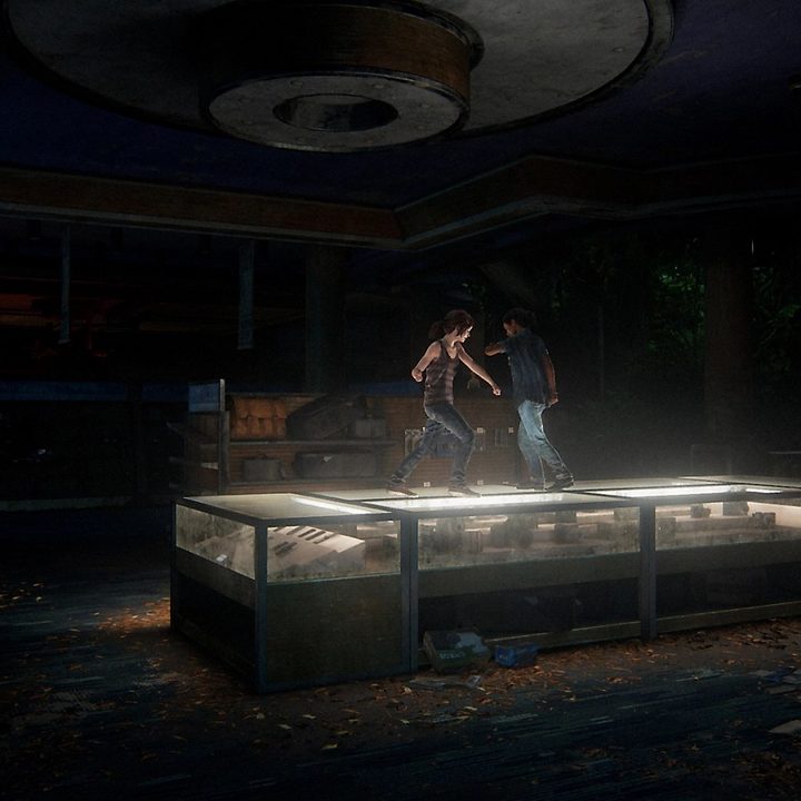 Ellie and Riley dancing on a glass case.