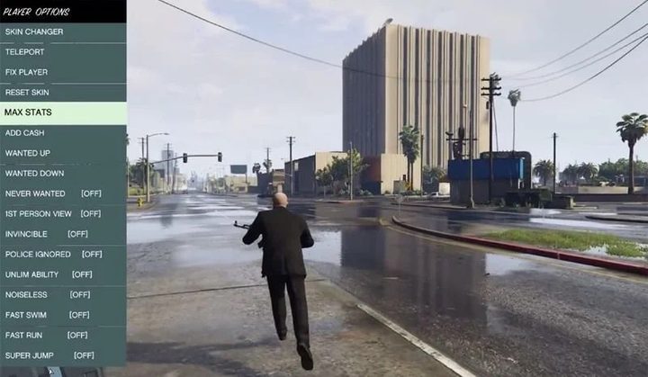 A bald man in a suit running down the street.