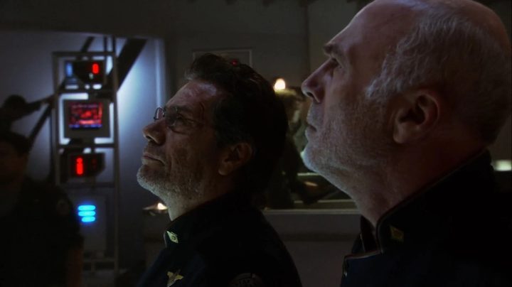 The tired and unshaven Adama and Tigh aboard the Battlestar Galactica in the episode "33."