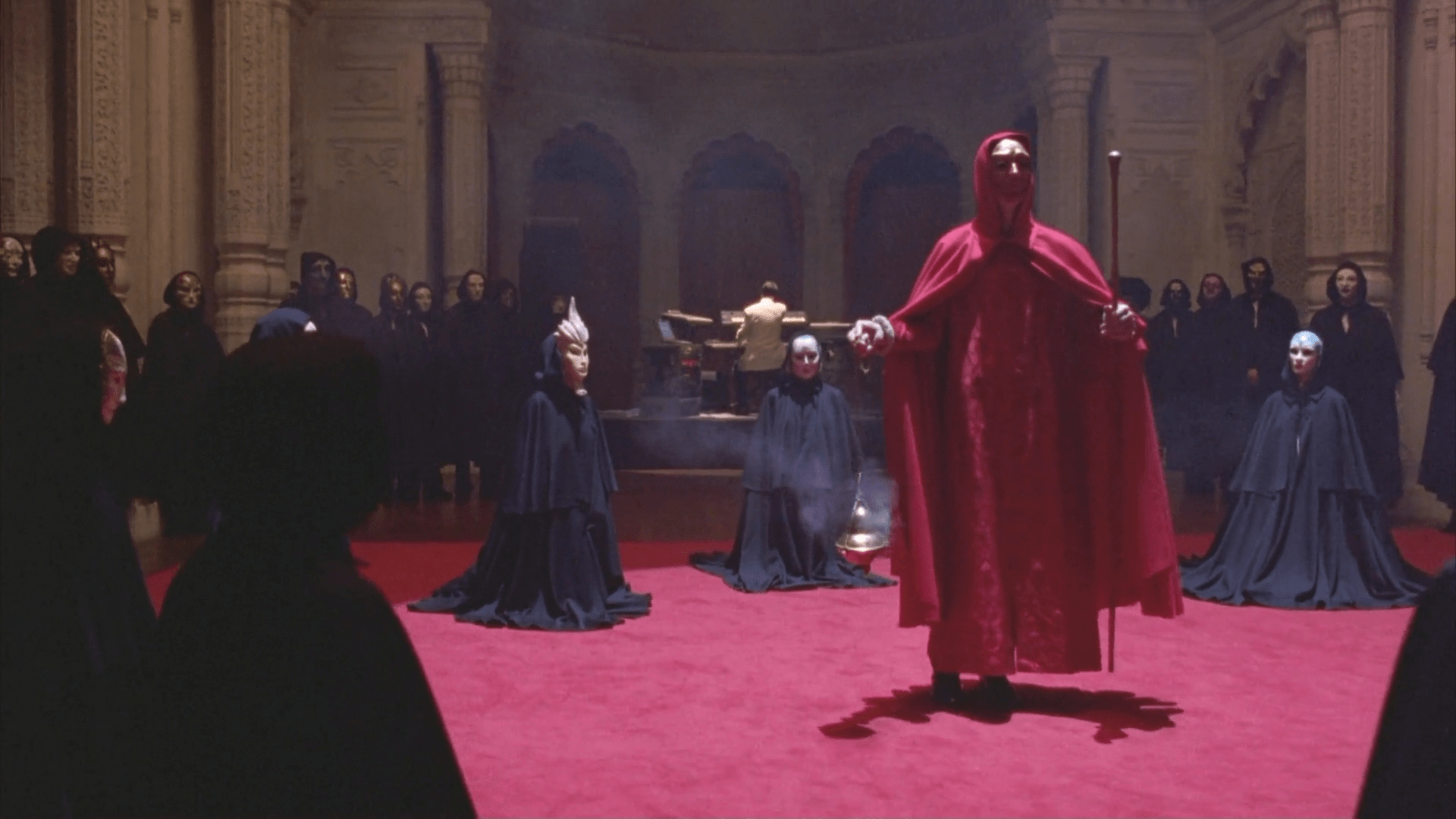 The iconic orgy sequence in Eyes Wide Shut.
